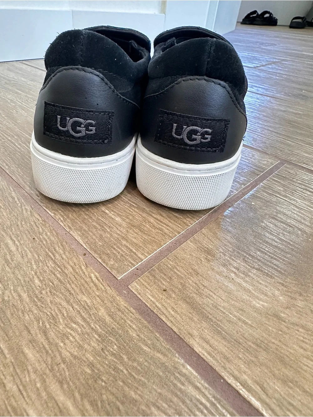 UGG Men's Black Suede Slip-On Sneakers with White Platform Sole